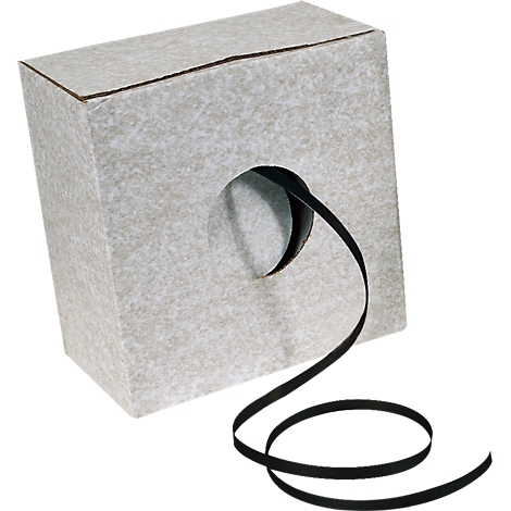 A roll of black ribbon emerging from a rectangular grey cardboard box.