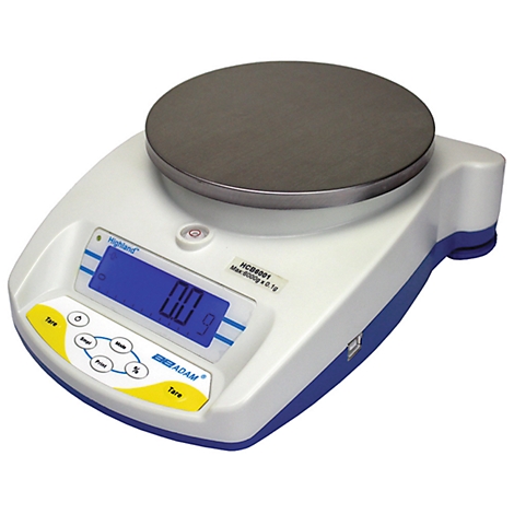 A digital lab scale with a round measuring field, display, and control elements. The display shows 0.0 g.