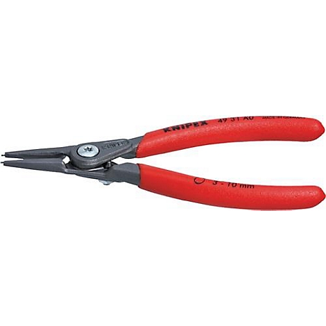 Close-up of pliers with red handles and the inscription Knipex.