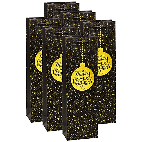 Zwarte wijntassen met gouden kerstversiering. "Merry Christmas" staat op een gouden kerstbal.