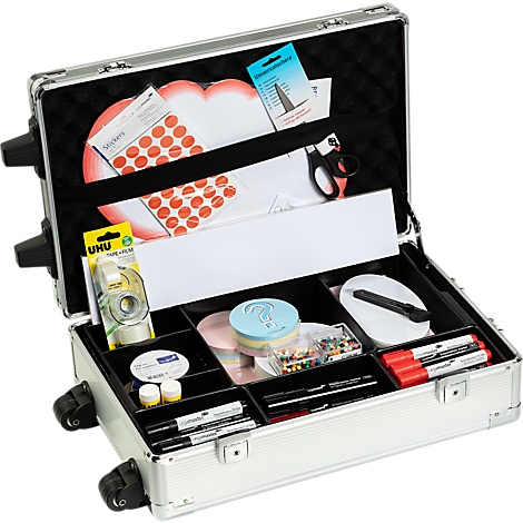 Open silver trolley with office supplies. Includes pens, tape, scissors, stickers, and notes.