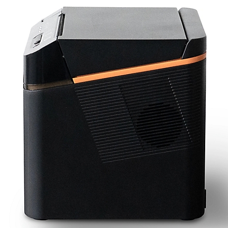 Schwarzes, rechteckiges Gerät mit orangefarbener Linie. Oberseite grau, Seitenteil mit schrägen Rillen. Auf der Oberseite Knöpfe.