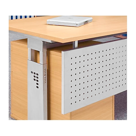 A desk with a wooden top and silver metal legs. There's a laptop on the top. On the front of the desk, there is a perforated metal plate.