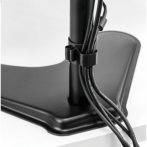 Black cables secured to a black pipe body. Cable management with Velcro, on a white background.
