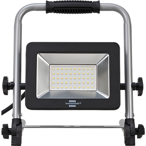 Un projecteur LED de construction portable avec un boîtier rectangulaire noir et unSupport en aluminium. La lampe présente environ 30 petites LED.