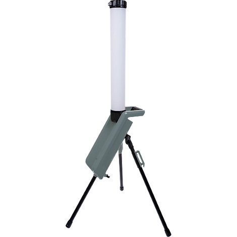 Une lampe portable sur un trépied. Une tête noire en haut, en dessous un luminaire blanc et un boîtier gris.