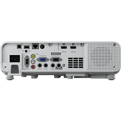 Arrière d'un projecteur blanc avec divers ports, dont HDMI, VGA et entrées audio. Il y a aussi un ventilateur et le câble d'alimentation.