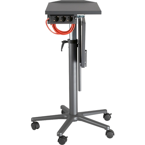 Grey height-adjustable standing desk with castors, power outlets and red cable.