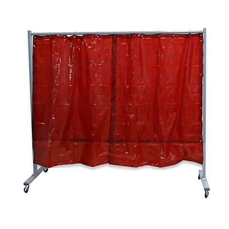 Red welding curtain in front of a gray frame on wheels. Transparent, folded tarpaulin protects against sparks.