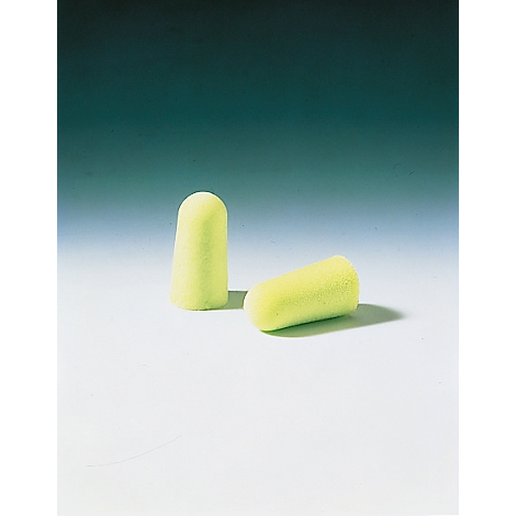 Two yellow earplugs on a white surface, one standing, the other lying.
