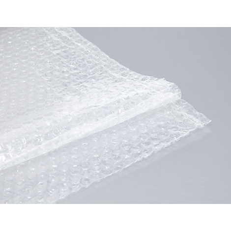 Close-up of two layers of bubble wrap against a light background. The transparent film forms many small air bubbles.