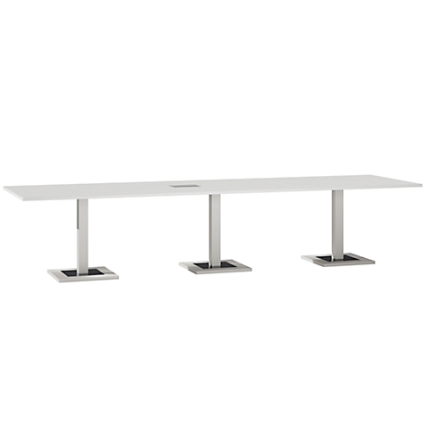 White rectangular table on three metal columns with black square bases.
