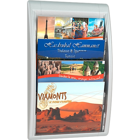 White brochure holder with colorful brochures. Brochures show travel destinations such as the Eiffel Tower and desert landscapes.