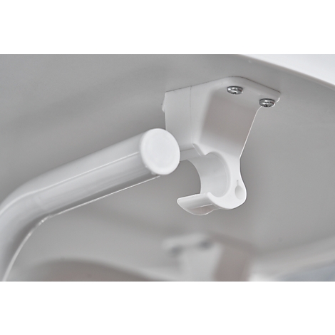 Close-up of white support system: tube, support, screws.