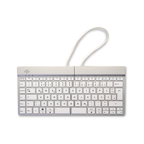 Weiße, kompakte, teilbare Tastatur mit deutschem Layout und weißem Kabel auf hellem Hintergrund.