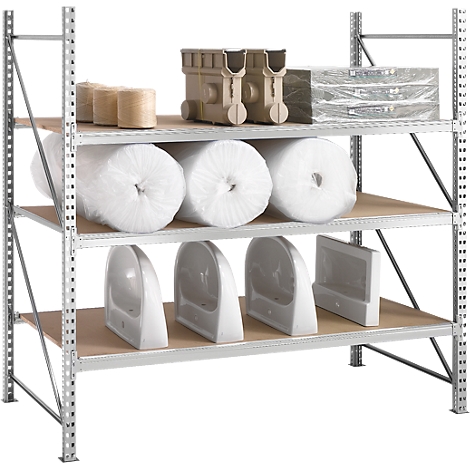 A storage rack with various items: rolls, plastic parts, gift wrapping. All arranged on different levels.