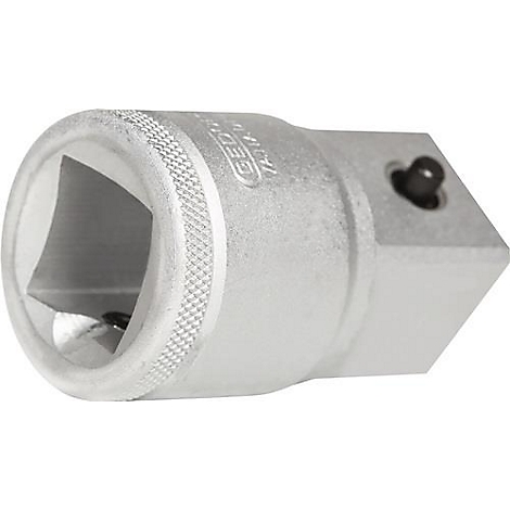 Adaptateur en métal argenté avec ouvertures carrées et hexagonales. Il y a une texture moletée sur le côté et un bouton noir.