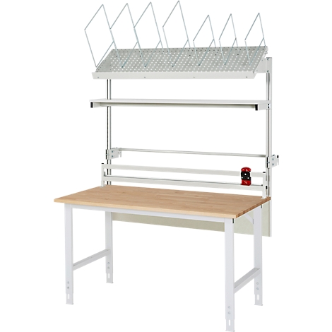 Werkbank mit Ablage und Papierrollenhalter. Holzplatte, weißes Gestell und Zubehör.