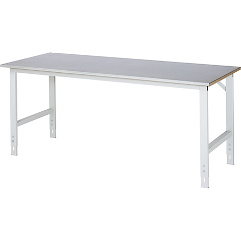 Een witte werkbank met een grijs tafelblad. Vierpoots tafel met metalen frame, van opzij gezien.