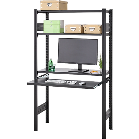 Étagère noire avec bureau, moniteur, clavier et boîtes de rangement. Il y a une petite plante sur le bureau.