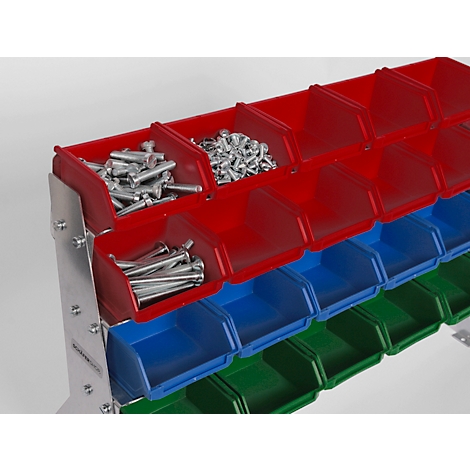 Bacs en plastique multicolores remplis de vis. Le support est en métal.
