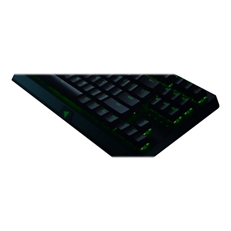 Schwarze Gaming-Tastatur, grün beleuchtet. Razer-Logo. Tasten mit grüner Schrift. Enter-Taste deutlich sichtbar.