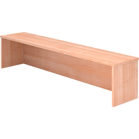 Wooden desk with light color. Open back and sides. Wood grain visible.