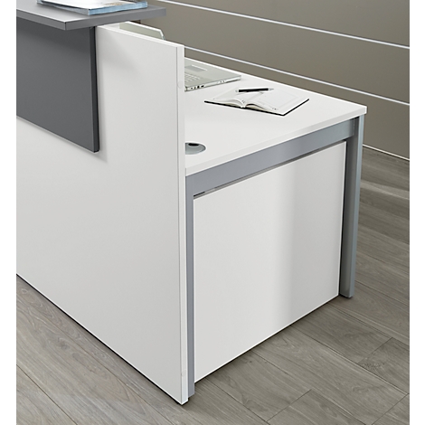 White reception desk with gray accents. On the surface are a notepad and a pen.