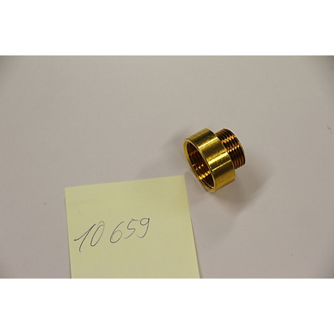Raccord doré à côté d'une note jaune portant l'inscription manuscrite "10 659".