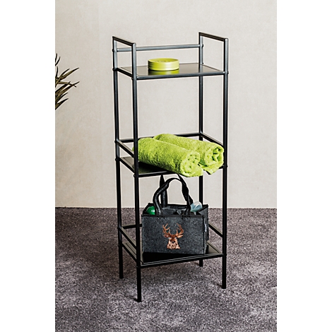 Schwarzes Metallregal mit grünen Handtüchern, einer Tasche und einem grünen Behälter.