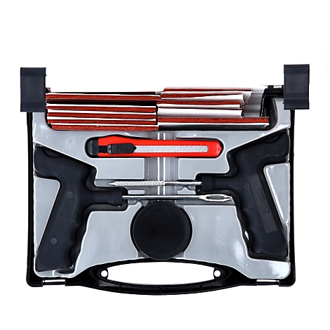 Reifenreparaturset in schwarzer Box. Enthält Flicken, Werkzeug und Cutter.