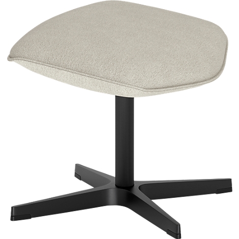 Tabouret moderne avec assise rembourrée beige sur un piétement noir à quatre branches sur fond neutre.