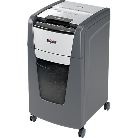 Rexel paper shredder, gray and white, with wheels. The container is full. There is lettering on the device.