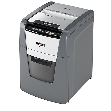 Gray Rexel paper shredder. Control buttons are above the paper entry. The collection bin is visible.