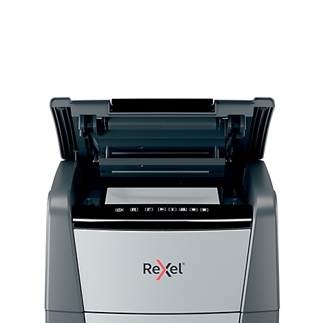 A gray paper shredder with the lid open. The "ReXel" logo is visible.