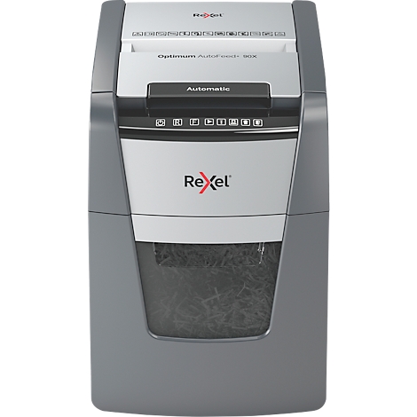 Gray paper shredder with Rexel logo and control panel. Paper waste visible in the collection container.