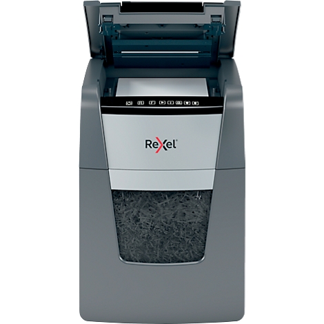 Grey paper shredder with open flap. Papers are shredded. Rexel logo.
