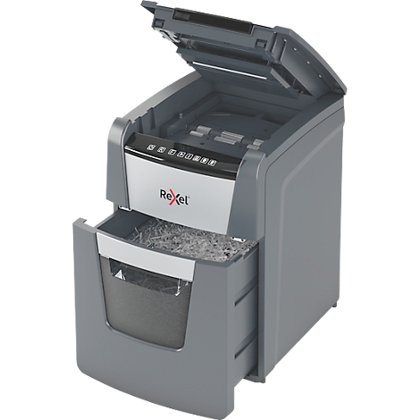 Grey paper shredder with open top, shredded paper in the bin.