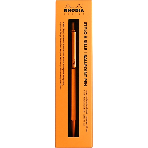 Orangener Kugelschreiber in einer orangefarbenen Schachtel. Aufschrift "RHODIA" und "STYLO A BILLE | BALLPOINT PEN".