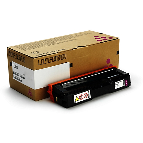 Cartouche de toner et emballage. Cartouche noire avec support orange, à côté d'une boîte en carton marron avec des points violets.