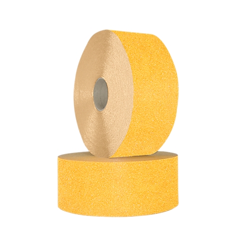Two rolls of yellow textured tape, arranged on top of each other.