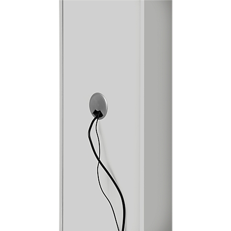 A gray cable inlet with black cables protruding from a white wall.