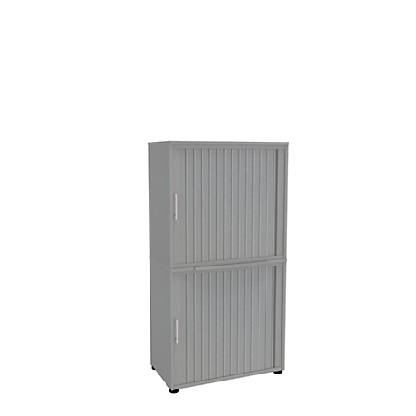 Gray cabinet with slatted doors, divided into two parts. Doors with handles.