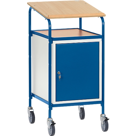 Blue and white cart with wooden top, casters and cabinet door. The table stands on rollers.