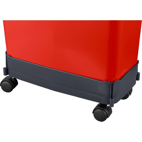 Close-up of a red container with a gray base and four castors. Black castors.