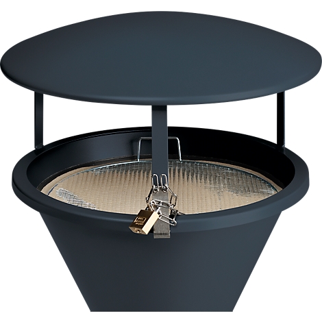 Dark grey trash can with lid, lock, and grate, close-up shot.