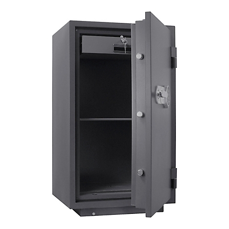 Coffre-fort gris avec porte ouverte. A l'intérieur, un compartiment avec clé, en dessous une étagère.