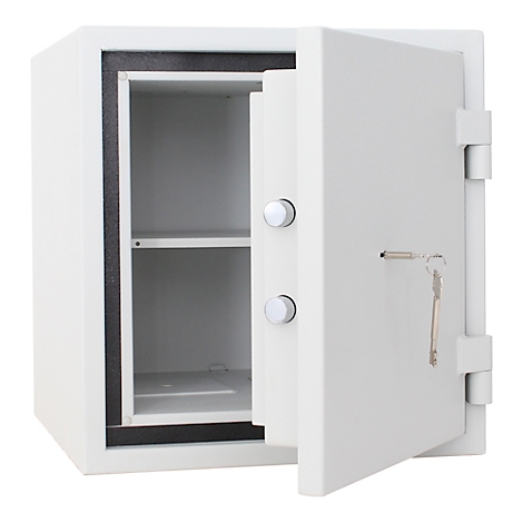 A white safe, its door open, reveals an empty interior with a shelf. Keys hang.
