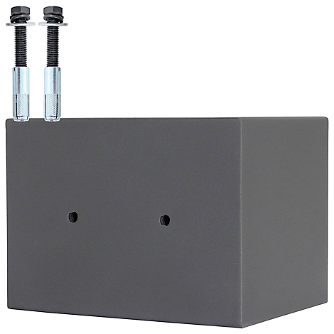 Ein grauer Metallblock mit zwei Schrauben. Zwei Löcher sind in der Vorderseite sichtbar.