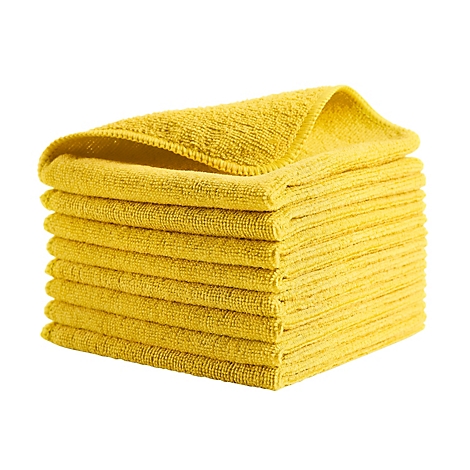 Une pile de chiffons en microfibre jaunes. Le chiffon supérieur est légèrement soulevé.